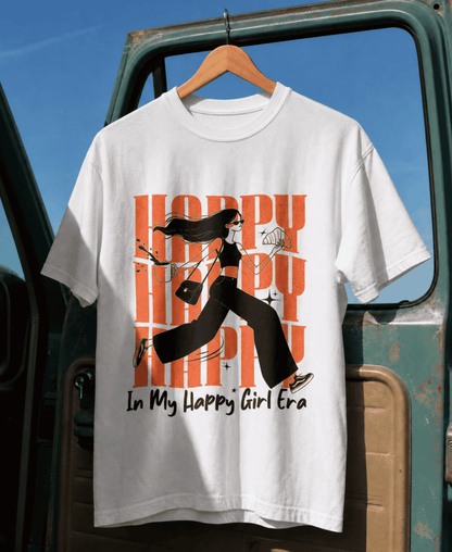 White t-shirt with graphic design and text on a hanger against a blue sky.